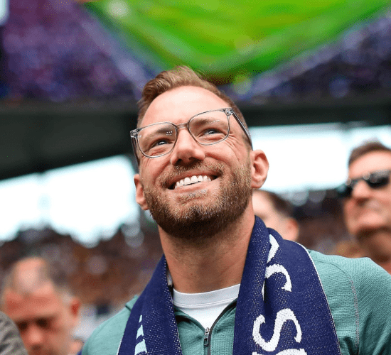 Board member Eric pitch side at Tottenham Hotspur Stadium.