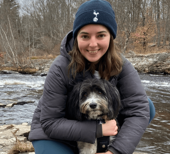 Board member Natasha outside with Charlie.